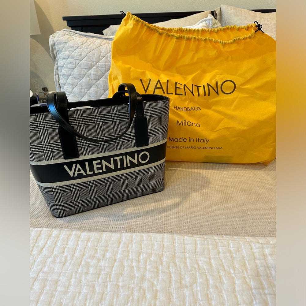 Like new Valentino tote bag. Used once. Comes with tags and dust bag.